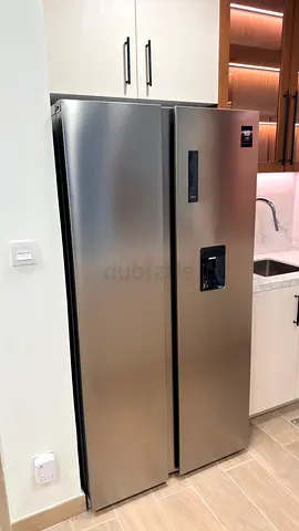 TEKA Stainless steel side-by-side refrigerator with water dispenser - Brand New