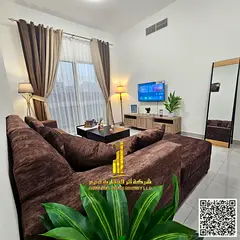Luxurious two-bedroom apartment with new furniture for monthly rent in Ajman - Corniche - behind the