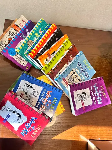 Diary of a Wimpy Kid book set - multiple paperback volumes, one for 20aed