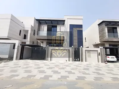 فيلا للبيع بالباهية عجمان 5 غرف ماستر + مجلس وصالة، تكييف مركزي، مساحة 3014/3400، تشطيب سوبر ديلوكس، موقف مسقوف، السعر 1,950,000