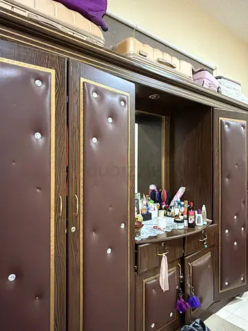 Bed and cupboard
