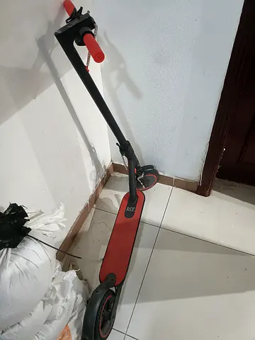 Red electric scooter — used, working