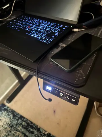 Adjustable motorized standing desk