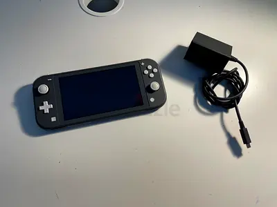 Nintendo Switch Lite (Grey) – Barely Used – Excellent Condition
