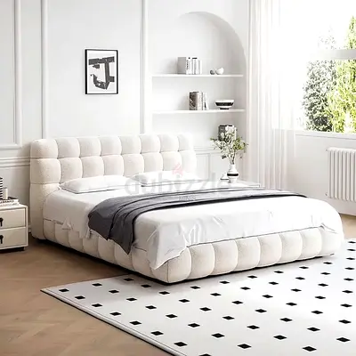 Tufted upholstered bed with padded headboard - cream