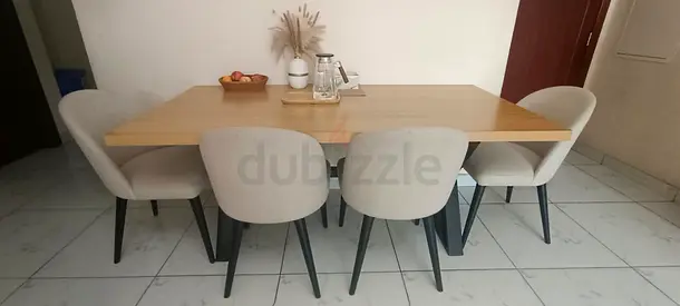 Light Wood 6-Seater Dining Table with Beige Upholstered Chairs