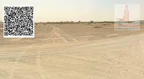 Two residential plots of land for sale in Masfout 3, totaling 16,790 square feet. Excellent location