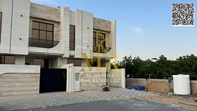 Two-story villa with a roof terrace, price includes registration and ownership fees, in one of Ajman