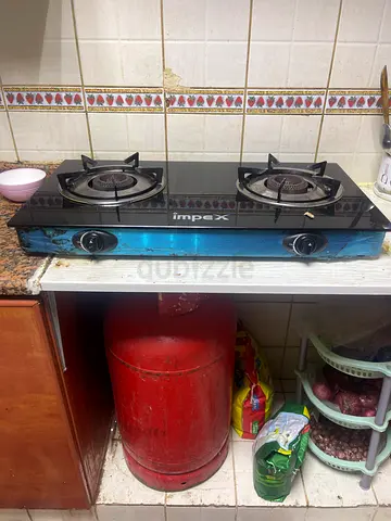 Two-burner portable gas stove with gas cylinder (used)