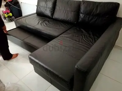 Black L-shaped Leather Sofa with  Storage  Good Used Condition