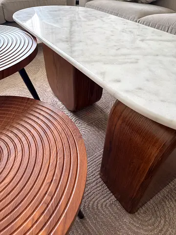 Marble-top coffee table with solid wood bases