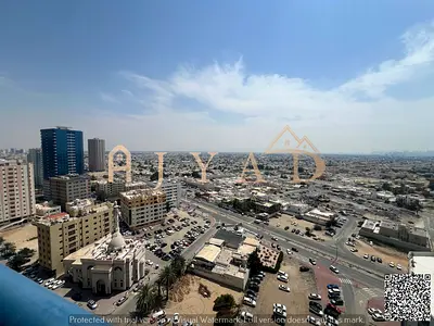 Free Parking | Upscale 2-Bedroom Apartment | Prime Location | 2 Bathrooms | Balcony | Central Air Conditioning | Super Deluxe Finishes | Next to Dubai