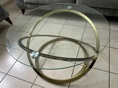 Round Glass Coffee Table with Gold Interlocking Ring Base
