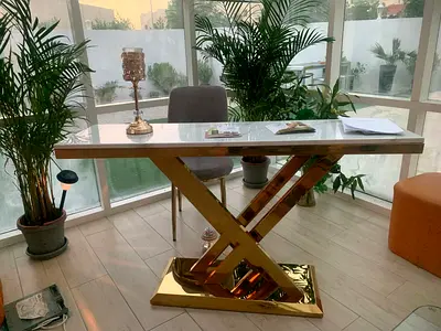 Two Marble Top Console Table and two coaches in very good condition . Price is 5000aed for all .