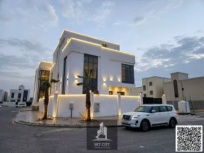 An architectural masterpiece in Al Zahia – Luxurious corner villa with a private elevator | 7 master bedrooms with high-end finishing | 3 floors with a built-up area exceeding 6,000 sq. ft. | Fully re