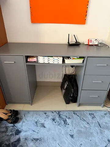 Grey storage cabinet with drawers, open shelf and cupboard (used)