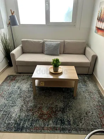 Beige 3-seater sofa with coffee table and Lamp — well kept