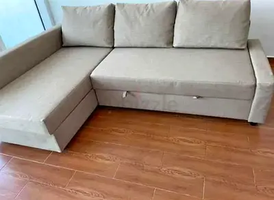 Beige L-shaped Sofa bed with Storage Good Condition