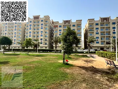 شقة واسعة مكونة من غرفتي نوم وصالة في قرية الأميرة، بنظام التقسيط على 7 سنوات مباشرة من المطور، موقع مميز، حديقة، منطقة ألعاب للأطفال