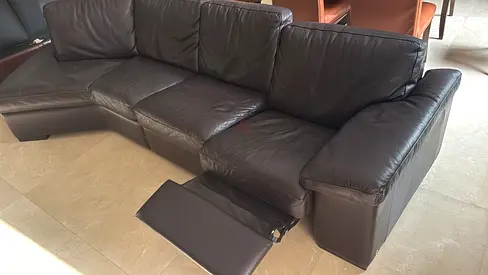 Natuzzi Large dark brown leather sectional sofa with recliner