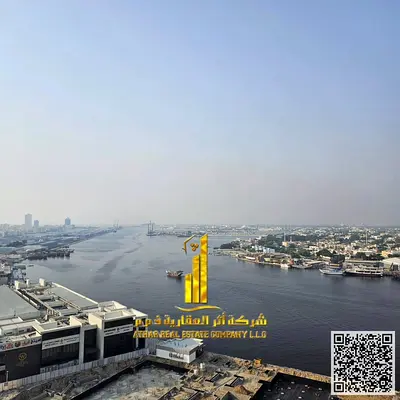 Luxurious two-bedroom apartment with a living room, open view, newly furnished, for monthly rent in Ajman - Al Rashidiya 1 - Oasis Towers