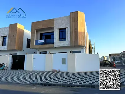Corner villa available for sale, including electricity, water, and air conditioning, in Ajman, Al Zahiyah area, surrounded by amenities. A stunning,