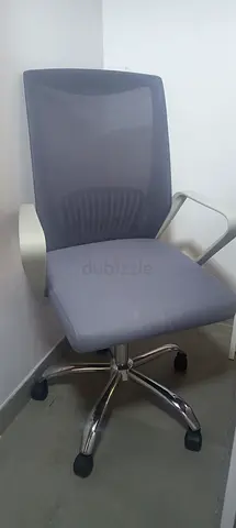 Grey mesh office chair with armrests - used