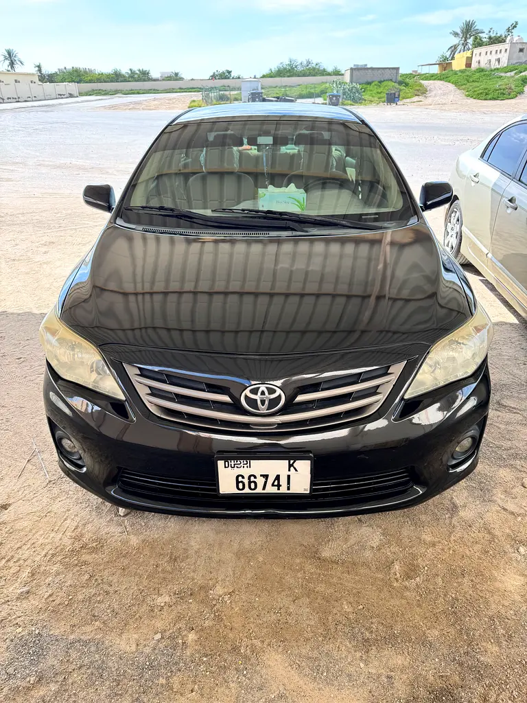 Toyota Corolla 2012 — photo 1 of 10