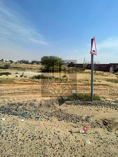 Prime commercial land for sale in Ajman – Al Helio 2! 6,027 sq.ft, ground permit, freehold for all