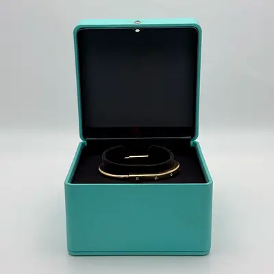 Authentic TIFFANY  CO DIAMOND LOCK BANGLE YELLOW GOLD WITH DIAMOND ACCENTS