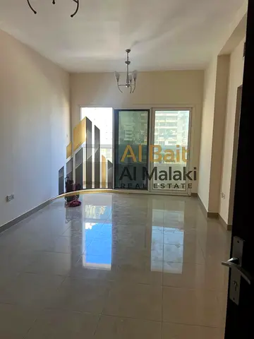 One bedrooms and a living room in Al Taawun with a balcony and open view