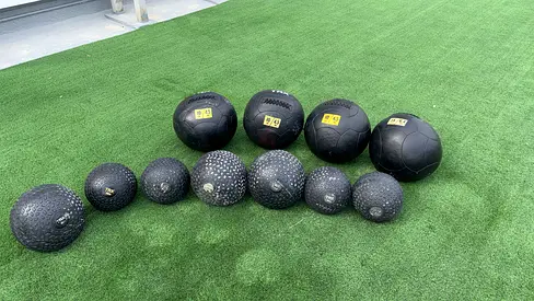 Set of slam/medicine balls — multiple sizes (used)