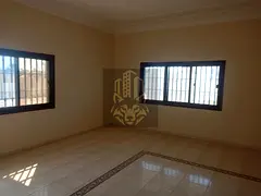 Villa for sale in Al Khuzamia, corner plot, 7 master bedrooms, majlis &amp; hall, annex 3 rooms, lan