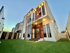 Luxury villa for sale in the prestigious Al Helio 2 area of ​​Ajman, including registration and 