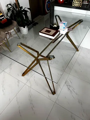 Stylish Glass Top Dining Table with Gold Legs