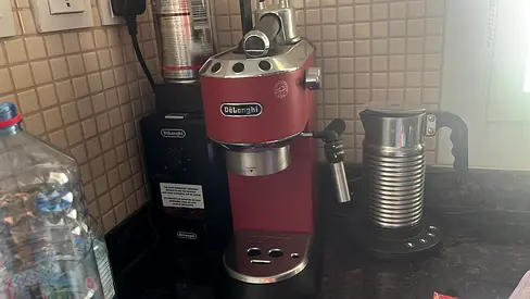 DeLonghi red espresso , Nespresso machine with milk frother + Delonghi Grinding