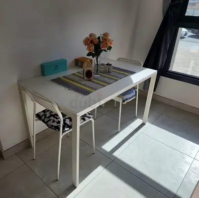 IKEA white rectangular dining table with 2 chairs - compact, good condition