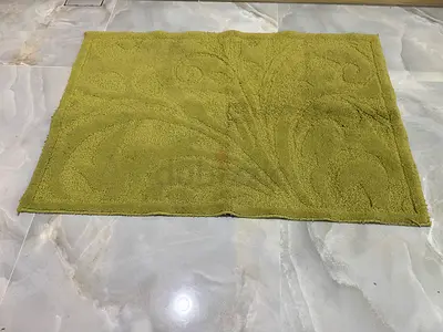Green textured bath mat/rug - good condition