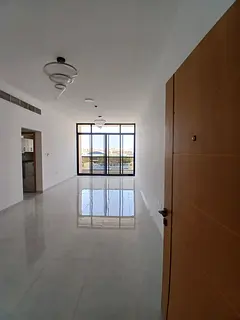 For annual rent: Two-bedroom apartment with living room + maid's room – first occupancy in Al 