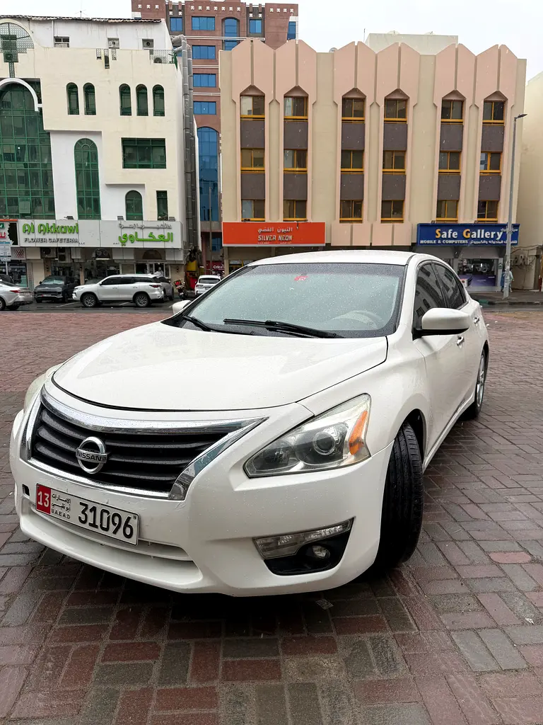 Nissan Altima 2013 — photo 1 of 14