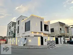 A distinctive villa in Al Yasmin area - Ajman, two floors + roof, strategic corner location, includi