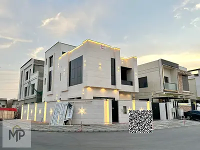 A distinctive villa in Al Yasmin area - Ajman, two floors + roof, strategic corner location, including water, electricity and air conditioning