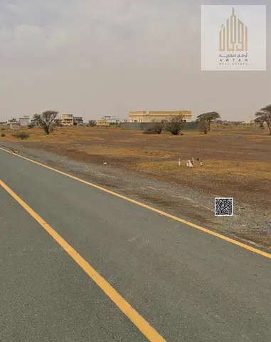 Private residential land for sale in Manama, Block 11. Large plot with ground and first floor permits, at a price below market value.