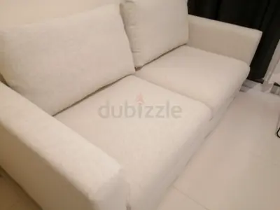 Light beige 2-seater fabric sofa - good condition