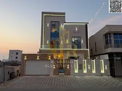 Luxury villa for sale in Al Bahia area, featuring two floors and a rooftop terrace. The price includ