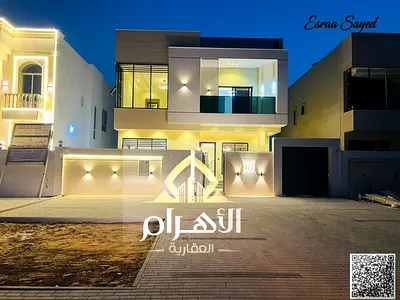 For sale in Al Zahiyah, Ajman: a luxurious modern villa with 5 bedrooms and a rooftop terrace. Super deluxe finishing. Bank financing available. Freeh