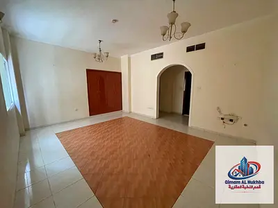 The best and most affordable two-bedroom apartment with a living room in Al Qasimia Al Mahatta, featuring central cooling and air conditioning, centra