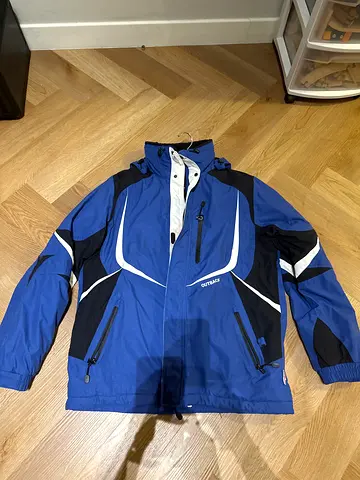 Blue Outback Winter Jacket  A stylish and functional blue winter jacket by Outback, designed for co