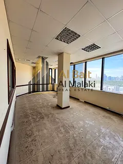 🏢✨ **Office for Annual Rent in Al Majaz 1 | Central AC Covered by Owner + Free Parking** ✨