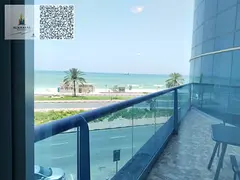 One bedroom and living room for sale in Corniche Residence Towers, Ajman. Stunning sea view. Own now